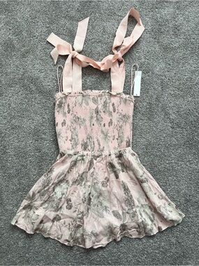 Alice and Olivia bow tied floral romper NWT